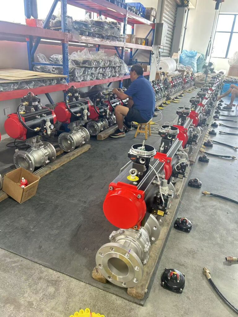 Fitting a pneumatic actuator onto a ball valve at the BAUTU plant