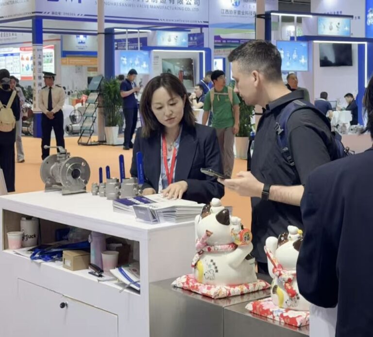 BAUTU sales team talking to buyers at a valve trade show
