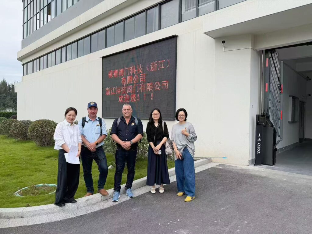Visiting customers with the BAUTU team outside the Baotai valve plant, Wenzhou